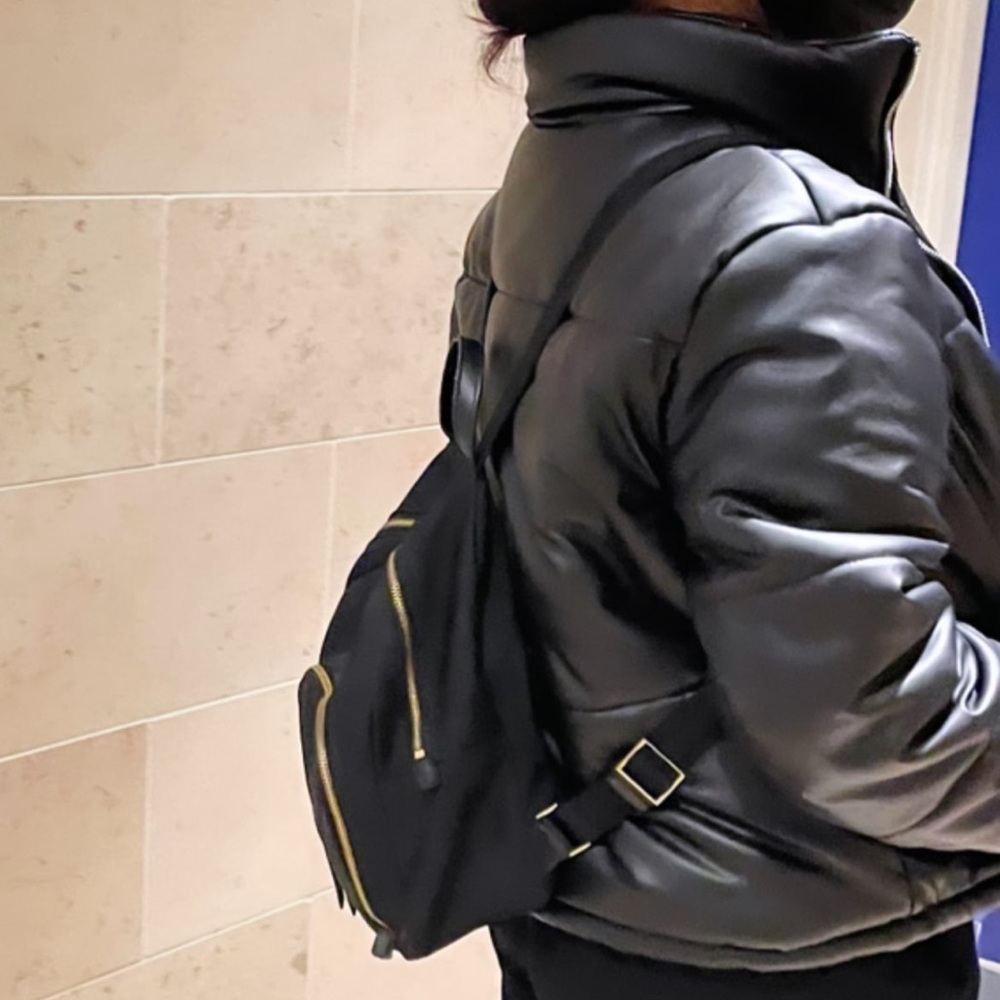 Black leather puffer jacket. Size S